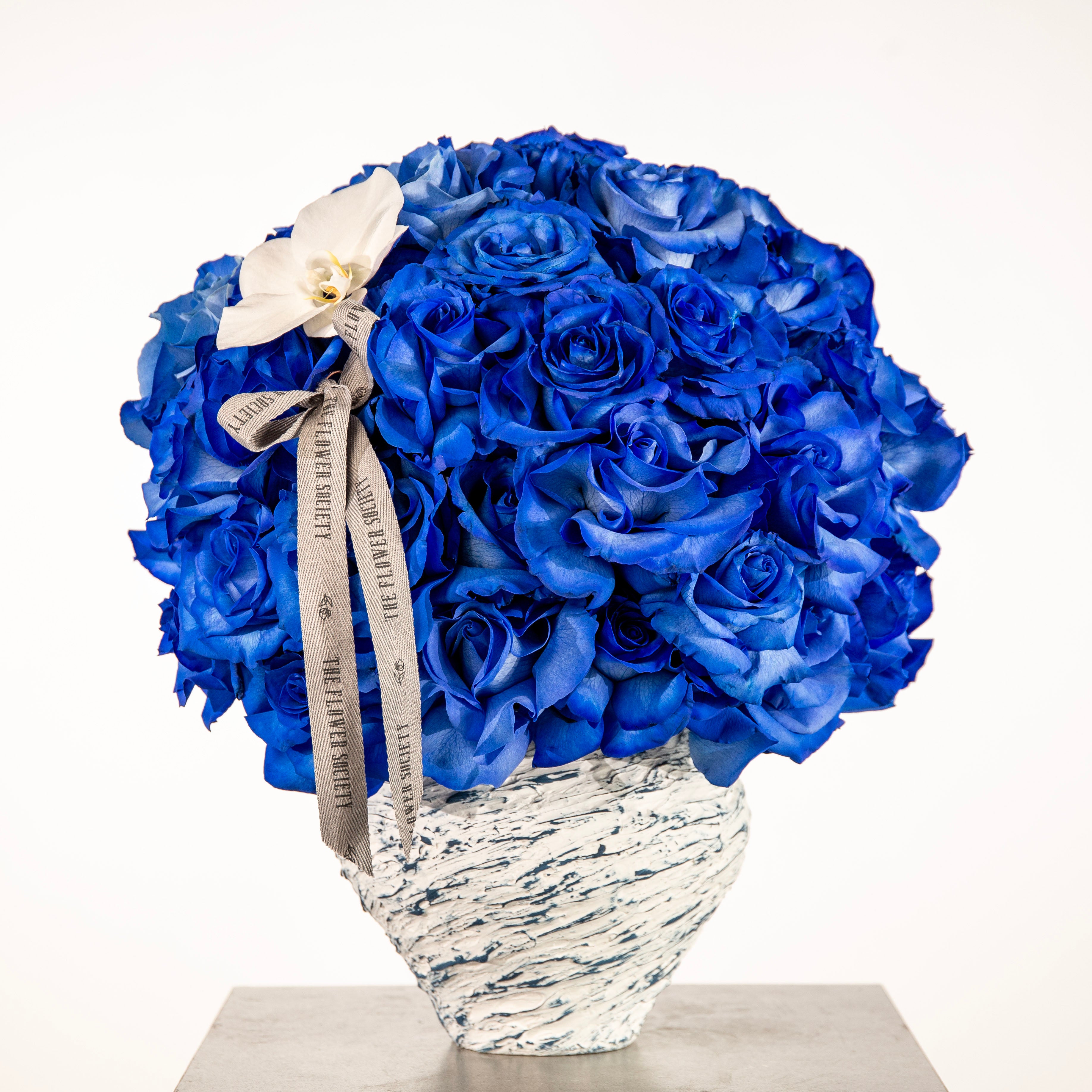50 blue rose phalaenopsis floral arrangement - premium blue rose bouquet UAE same day florist