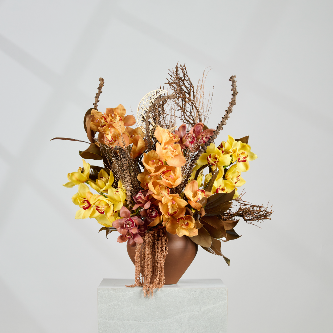 Sundown luxury Cymbidium iftar installation front view 20cm clay pot Ramadan Dubai